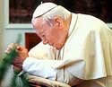 Pope John Paul II praying