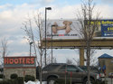 MyLameSexLife.com billboard, next to a Hooters restaurant.